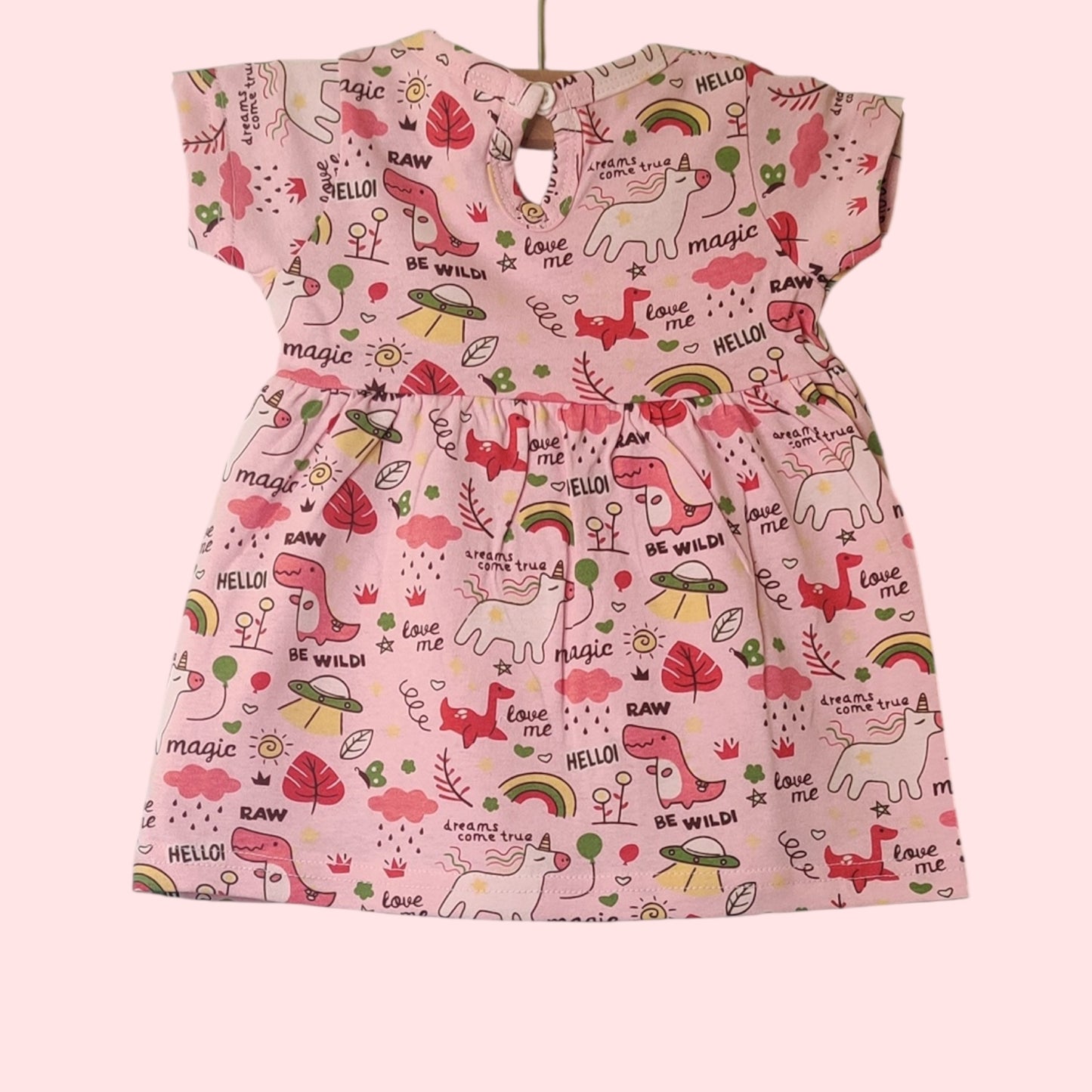Baby pink unicorn and rainbow print frock with snap closure